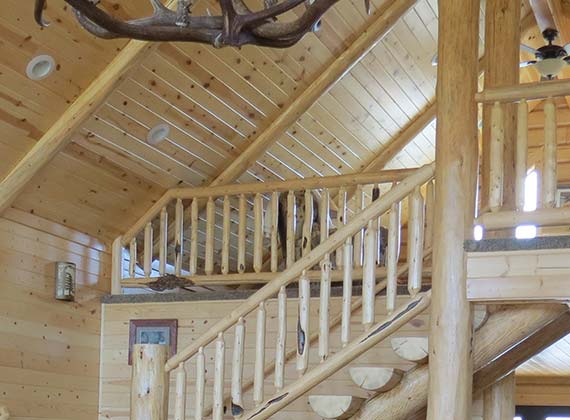 Arbogast Custom Log Home Stairway Living Room